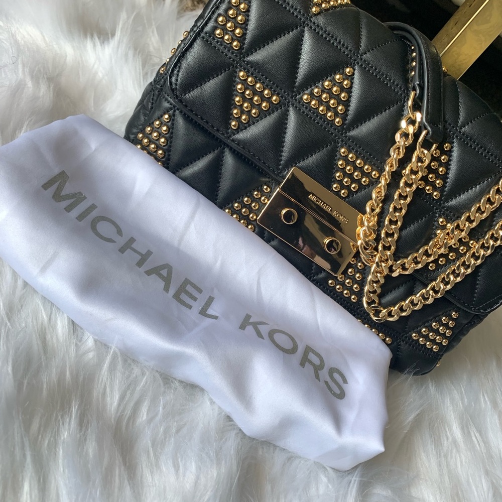 Michael Kors quilted imitation lamb skin